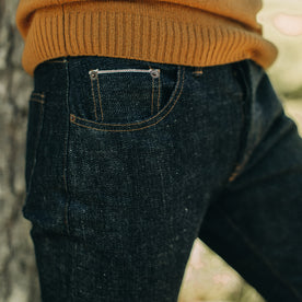 fit model showing selvage pocket on The Slim Jean in Umeda Selvage, Bottoms by Taylor Stitch