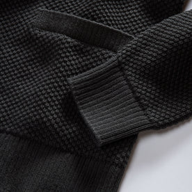 material shot of the ribbed cuffs on The Crawford Sweater in Charcoal, Knits by Taylor Stitch