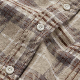 material shot of the buttons on The Ledge Shirt in Fossil Plaid, Wovens by Taylor Stitch