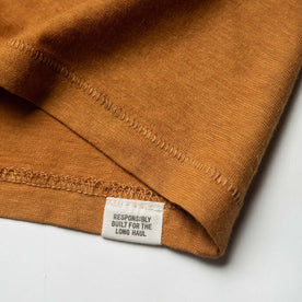 material shot of pickstitch hem with woven label, Knits by Taylor Stitch