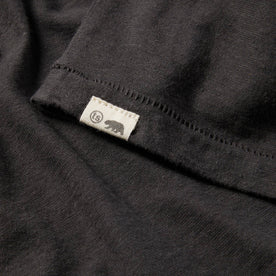 material shot of The Cotton Hemp Tee in Flower Power showing the sewn in front tag, Knits by Taylor Stitch