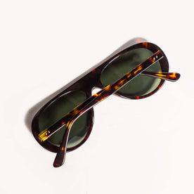 The Surf Aviator in Dark Tortoise upside down, folded in, studio shot, Accessories by Taylor Stitch