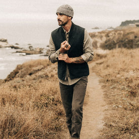 fit model wearing The Workhorse Vest in Coal Boss Duck, looking left, Outerwear by Taylor Stitch