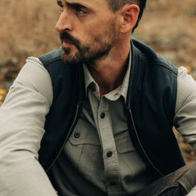 fit model wearing The Workhorse Vest in Coal Boss Duck, chest detail, Outerwear by Taylor Stitch