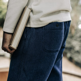 fit model showing off back detail on The Apres Pant in Indigo Waffle, Bottoms by Taylor Stitch