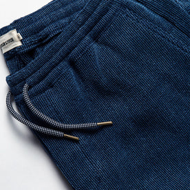 material shot of the drawstrings on The Apres Pant in Indigo Waffle, Bottoms by Taylor Stitch