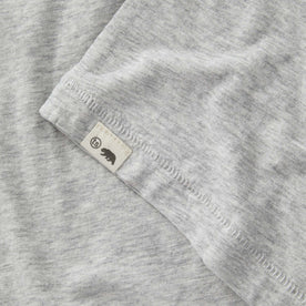 material shot of the logo on The Cotton Hemp Tee in Heather Grey, Knits by Taylor Stitch