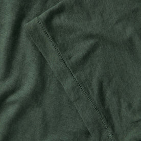 material shot of the cuff on The Cotton Hemp Tee in Pine, Knits by Taylor Stitch