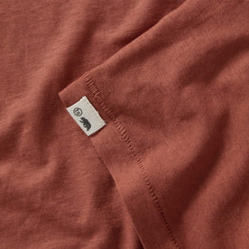 material shot of the logo patch  on The Cotton Hemp Long Sleeve in Engine, Knits by Taylor Stitch