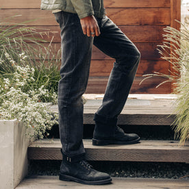 fit model walking up stairs in The Democratic Jean in Black 3-Month Wash Selvage, Bottoms by Taylor Stitch