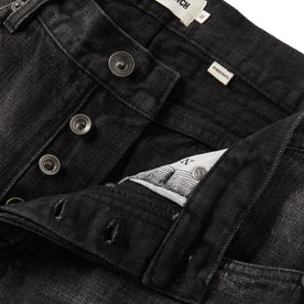 material shot of the button-fly on The Democratic Jean in Black 3-Month Wash Selvage, Bottoms by Taylor Stitch