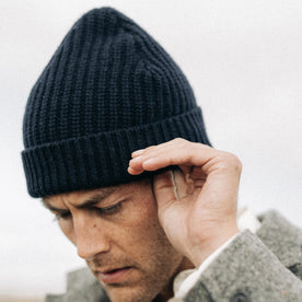 fit model adjusting The Fisherman Beanie in Dark Navy, Accessories by Taylor Stitch