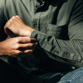 fit model fixing cuffs on The Jack in Spruce Houndstooth Check, Wovens by Taylor Stitch