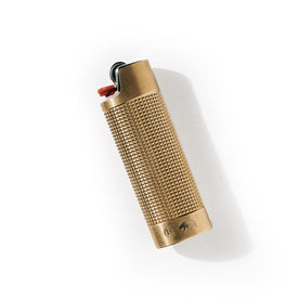 editorial image of The Lighter Sleeve in Brass flatlay, Accessories by Taylor Stitch