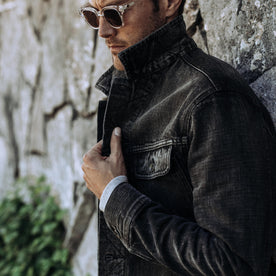 fit model with collar popped wearing The Long Haul Jacket in Black 3-Month Wash Selvage, Outerwear by Taylor Stitch