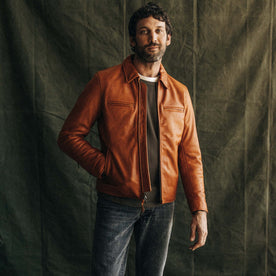 fit model posing in The Moto Jacket in Whiskey Steerhide, Outerwear by Taylor Stitch