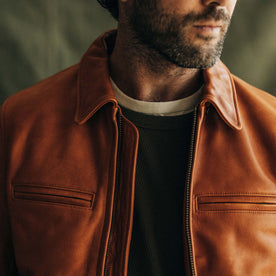 fit model showing the front of The Moto Jacket in Whiskey Steerhide, Outerwear by Taylor Stitch