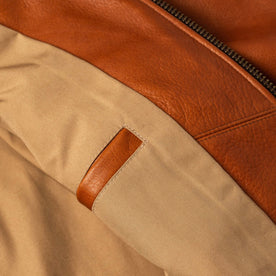 material shot of the inner pocket on The Moto Jacket in Whiskey Steerhide, Outerwear by Taylor Stitch