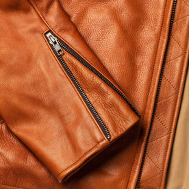 material shot of the cuff detail on The Moto Jacket in Whiskey Steerhide, Outerwear by Taylor Stitch