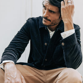 fit model sitting wearing The Ojai Jacket in Coal Cord, Outerwear by Taylor Stitch