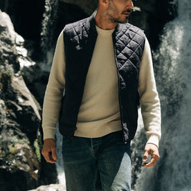 fit model posing in The Quilted Bomber Vest in Navy Dry Wax, Outerwear by Taylor Stitch