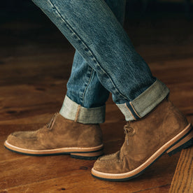 fit model showing off the side detail of The Rambler Chukka in Mushroom Suede, Footwear by Taylor Stitch