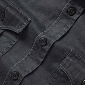 material shot of the buttons on The Saddler Shirt in Washed Coal, Wovens by Taylor Stitch