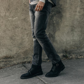 fit model walking in The Slim Jean in Black 3-Month Wash Selvage, Bottoms by Taylor Stitch