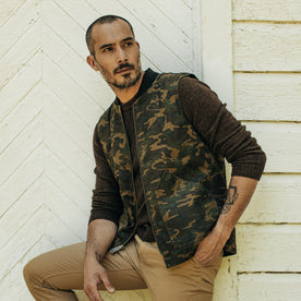 fit model posing in The Workhorse Vest in Camo Boss Duck, Outerwear by Taylor Stitch