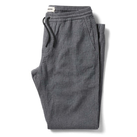 flatlay of The Apres Pant in Heather Grey Double Cloth folded, Bottoms by Taylor Stitch