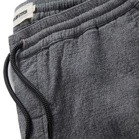 material shot of the drawstring and band on The Apres Pant in Heather Grey Double Cloth, Bottoms by Taylor Stitch