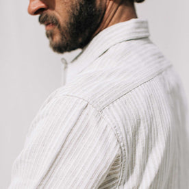 our fit model wearing The Short Sleeve Hawthorne in Natural Stripe, Wovens by Taylor Stitch