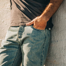 our fit model wearing The Democratic Jean in 24-Month Wash Japanese Selvage—left hand in pocket, close up shot, Denim by Taylor Stitch