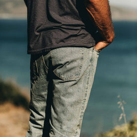 our fit model wearing The Slim Jean in 24-Month Wash Japanese Selvage—back detail shot, Denim by Taylor Stitch