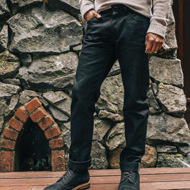 our fit model wearing The Democratic Jean in Black Selvage, Denim by Taylor Stitch