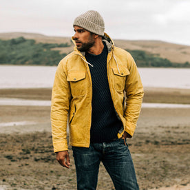 our fit model wearing The Winslow Parka in Mustard Waxed Canvas, Outerwear by Taylor Stitch