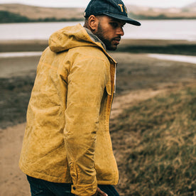 our fit model wearing The Winslow Parka in Mustard Waxed Canvas, Outerwear by Taylor Stitch