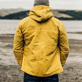 our fit model wearing The Winslow Parka in Mustard Waxed Canvas, Outerwear by Taylor Stitch