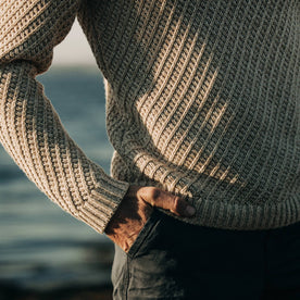 fit model wearing The Adirondack Sweater in Natural, hand in pocket, cropped, Knits by Taylor Stitch