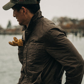 fit model wearing The Longshore Jacket in Dark Oak Waxed Canvas, cropped shot of side shoulder, Outerwear by Taylor Stitch