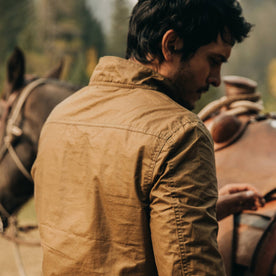 fit model wearing The Bomber Jacket in Field Tan Wax Canvas, back, Outerwear by Taylor Stitch