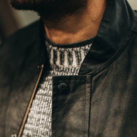 fit model wearing The Bomber Jacket in Black Dry Wax, button close up, Outerwear by Taylor Stitch