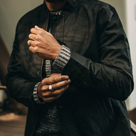 fit model wearing The Bomber Jacket in Black Dry Wax, sleeve, Outerwear by Taylor Stitch