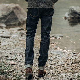 fit model wearing The Slim Jean in Cone Mills Reserve Selvage, back shot, Denim by Taylor Stitch