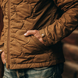 fit model wearing The Vertical Jacket in British Khaki Dry Wax, hand in pocket, Outerwear by Taylor Stitch