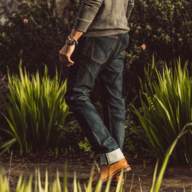 Our fit model wearing The Democratic Jean in Organic Stretch Selvage., Denim by Taylor Stitch