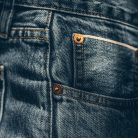 Detail shot of the 24 month wash denim worn by our fit model, Denim by Taylor Stitch