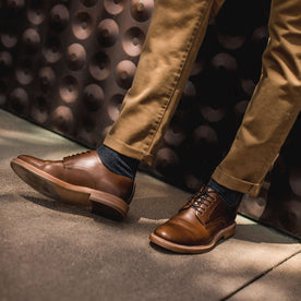 Our fit model posing in the oxford shoe, Footwear by Taylor Stitch