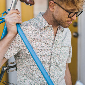 Our fit model wearing The Short Sleeve Hawthorne in California Poppy., Wovens by Taylor Stitch