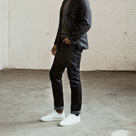 our fit model wearing The Slim Jean in Yamaashi Orimono Recover Selvage, Denim by Taylor Stitch